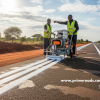 Prime Roads contractors applying thermoplastic paint on African roads.